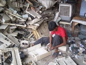 Young person sorting plastic waste